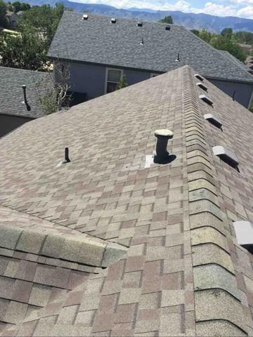 Crest of the New Roof - This home in Littleton, CO was upgraded to a brand new lifetime shingle and upgraded ventilation for the shingles to last longer.
